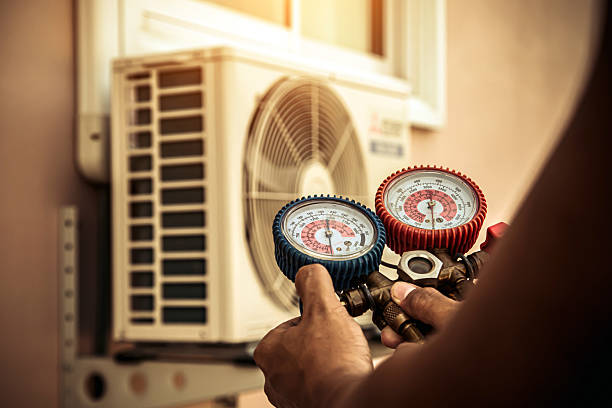 Professional Hvac technician working in Round Mountain, NV